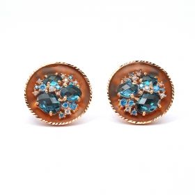 Rose gold earrings with blue topaz and zircons