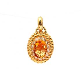 Yellow gold pendant with yellow topaz and zircons