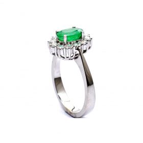 White gold ring with diamond 0.50 ct and emerald 1.16 ct