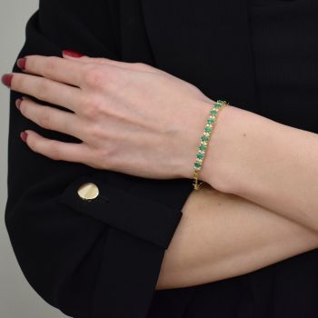Yellow gold bracelet with diamonds 0.28 ct and emeralds 2.28 ct