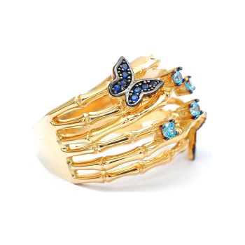 Gold ring with blue topaz and tourmaline