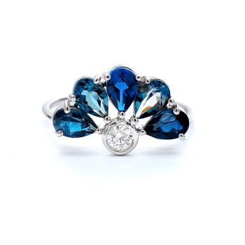 White gold ring with diamonds 0.13 ct and blue topaz 2.21 ct