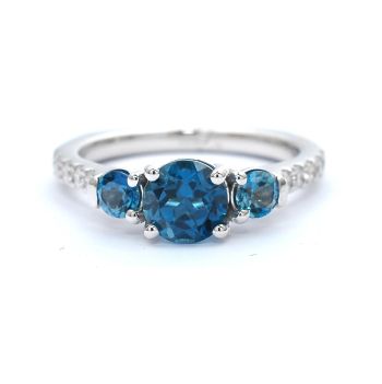White gold ring with diamonds 0.18 ct and blue topaz 1.56 ct