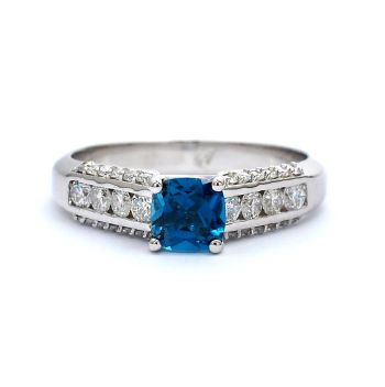 White gold ring with diamonds 0.54 ct and blue topaz 0.73 ct