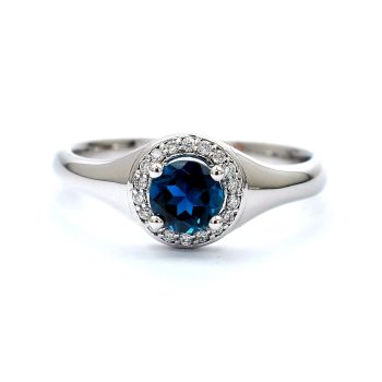 White gold ring with diamonds 0.10 ct and blue topaz 0,53 ct