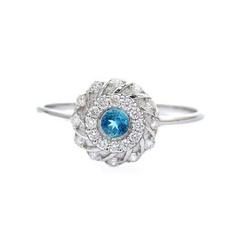 White gold ring with diamonds 0.24 ct and blue topaz 0,13 ct