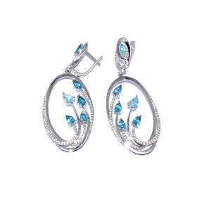 White gold earrings with zircons and blue topaz